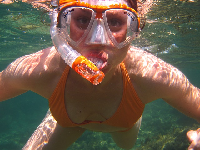 woman wearing two piece snorkeling