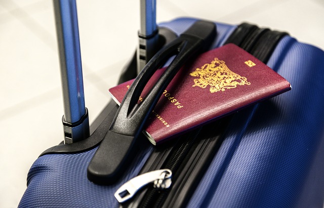 Passport on top of a traveling bag